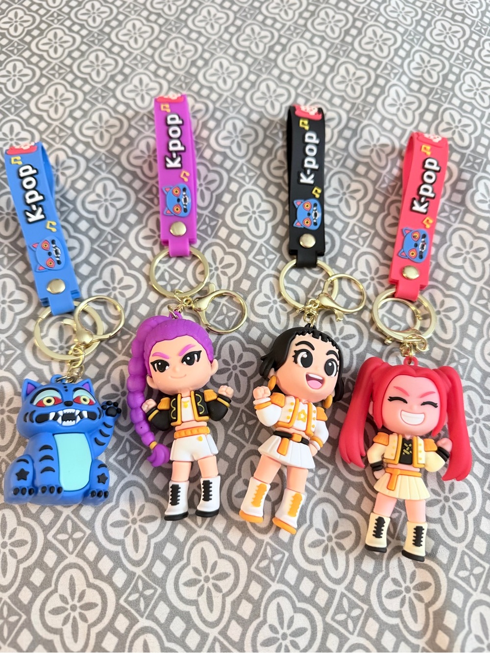 K-pop Character Keychain Set — Bright Blue, Purple, Black, Red - Picture 1 of 5
